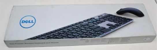A boxed as new Dell KM717 Premier Keyboard And Mouse Set (QWERTY - UK) (Box sealed, some cosmetic
