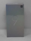 A boxed as new Xiaomi Mi 9 Global Version 6GB RAM 64GB Storage Android Smartphone in Ocean Blue