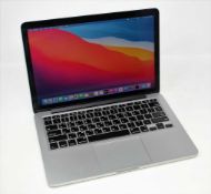 A pre-owned Apple MacBook Pro (Retina, 13
