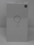 A boxed as new Xiaomi Mi 9 SE Global Version 6GB RAM 64GB Storage Android Smartphone in Piano Black