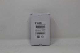 A boxed as new Trimble Rechargeable Li-Ion Battery For Robotic Total Stations (P/N: 99511-30).