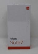 A boxed as new Redmi 7 3GB RAM 32GB Storage Global Version in Space Black (Box sealed,