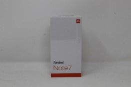 A boxed as new Redmi 7 3GB RAM 32GB Storage Global Version in Space Black (Box sealed,