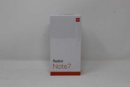 A boxed as new Redmi 7 3GB RAM 32GB Storage Global Version in Space Black (Box sealed,