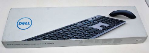 A boxed as new Dell KM717 Premier Keyboard And Mouse Set (QWERTY - UK) (Box sealed, some cosmetic