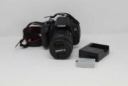 A pre-owned Canon EOS 700D Digital SLR Camera with Canon EF-S 10-18mm F/4.5-5.6 IS STM Lens, Canon