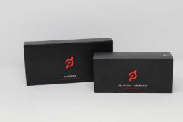 A boxed as new Peloton PL-HR-C-01 Heart Rate Monitor and a boxed as new pair of Peloton x