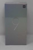A boxed as new Xiaomi Mi 9 Global Version 6GB RAM 64GB Storage Android Smartphone in Ocean Blue