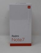 A boxed as new Redmi 7 3GB RAM 32GB Storage Global Version in Space Black (Box sealed,