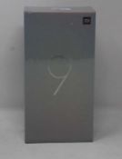 A boxed as new Xiaomi Mi 9 Global Version 6GB RAM 128GB Storage Android Smartphone in Ocean Blue