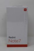A boxed as new Redmi 7 3GB RAM 32GB Storage Global Version in Space Black (Box sealed,