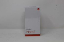 A boxed as new Redmi 7 3GB RAM 32GB Storage Global Version in Space Black (Box sealed,