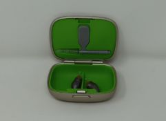An as new pair of Phonak Virto M90-Titanium Hearing Aids (REF: 063-0488-01) with case, cleaning kit,