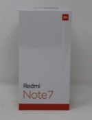 A boxed as new Redmi 7 3GB RAM 32GB Storage Global Version in Space Black (Box sealed,