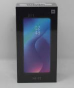 A boxed as new Xiaomi Mi 9T 6GB RAM 128GB Storage Android Smartphone in Glacier Blue (Box sealed,