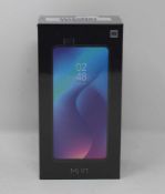 A boxed as new Xiaomi Mi 9T 6GB RAM 64GB Storage Android Smartphone in Carbon Black (Box sealed,