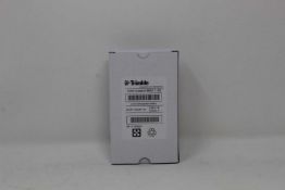 A boxed as new Trimble Rechargeable Li-Ion Battery For Robotic Total Stations (P/N: 99511-30).