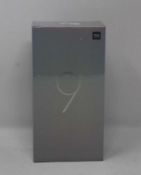 A boxed as new Xiaomi Mi 9 Global Version 6GB RAM 128GB Storage Android Smartphone in Ocean Blue