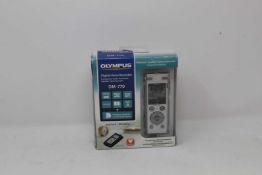 A boxed as new Olympus DM-770 Digital Voice Recorder (Box sealed, seal broken on one side. Some