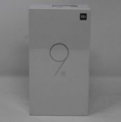 A boxed as new Xiaomi Mi 9 SE Global Version 6GB RAM 128GB Storage Android Smartphone in Piano Black