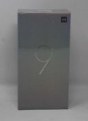 A boxed as new Xiaomi Mi 9 Global Version 6GB RAM 64GB Storage Android Smartphone in Ocean Blue