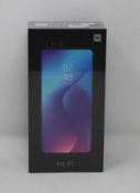 A boxed as new Xiaomi Mi 9T 6GB RAM 128GB Storage Android Smartphone in Glacier Blue (Box sealed,