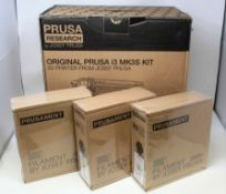 A boxed as new Original Prusa i3 MK3S 3D printer kit(box opened, cosmetic damage to box) and three b