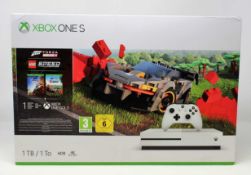 A boxed as new Xbox One S 1TB Console, Forza Horizon 4 and Lego Speed Champions Bundle (Box