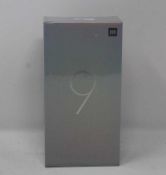 A boxed as new Xiaomi Mi 9 Global Version 6GB RAM 128GB Storage Android Smartphone in Ocean Blue