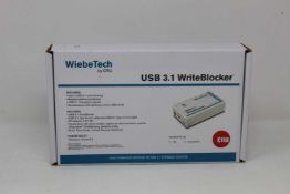 A boxed as new WiebeTech by CRU USB 3.1 WriteBlocker (International version) (Box sealed).