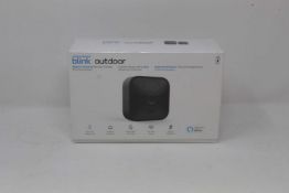 A boxed as new Blink Outdoor Smart Security Camera System in Black (1 camera set UK) (Box sealed).