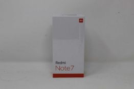 A boxed as new Redmi 7 3GB RAM 32GB Storage Global Version in Space Black (Box sealed,