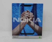 A boxed as new Nokia X7 TA-1131 DS 6GB 64GB Android Smartphone in Dark Night Blue