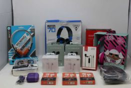 A quantity of assorted as new in-ear and over ear headphones.