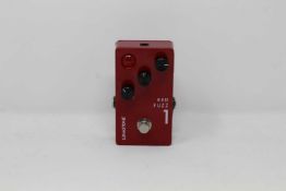 A pre-owned Lunastone Red Fuzz 1 Guitar Pedal (No power adaptor included) (Untested, sold as seen).