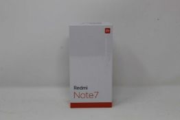 A boxed as new Redmi 7 3GB RAM 32GB Storage Global Version in Space Black (Box sealed,