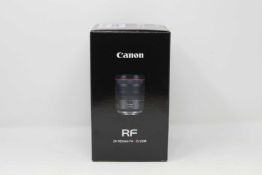 A boxed as new Canon RF 24-105mm f/4 L IS USM Lens (Box opened).