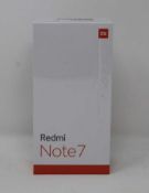 A boxed as new Redmi 7 3GB RAM 32GB Storage Global Version in Space Black (Box sealed,