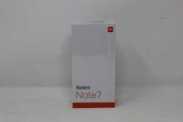 A boxed as new Redmi 7 3GB RAM 32GB Storage Global Version in Space Black (Box sealed,