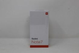 A boxed as new Redmi 7 3GB RAM 32GB Storage Global Version in Space Black (Box sealed,