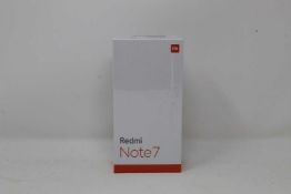 A boxed as new Redmi 7 3GB RAM 32GB Storage Global Version in Space Black (Box sealed,