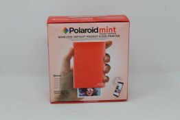 A boxed as new Polaroid Mint Wireless Instant Pocket Printer in Red (M/N: POLMP02R) (Box sealed).