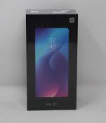 A boxed as new Xiaomi Mi 9T 6GB RAM 128GB Storage Android Smartphone in Glacier Blue (Box sealed,