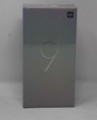 A boxed as new Xiaomi Mi 9 Global Version 6GB RAM 64GB Storage Android Smartphone in Ocean Blue