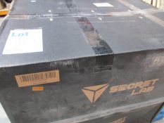 A boxed as new Secret Lab Titan Softweave Cookies & Cream 2020 gaming chair.