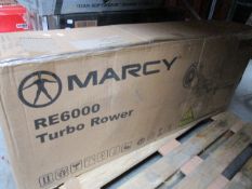 A boxed as new Marcy RE6000 Turbo Power rowing machine (Some cosmetic damage to box).