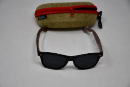Five pairs of as new Woodies sunglasses.