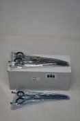 Twelve as new Abbfabb pet grooming scissors (Over 18s only).
