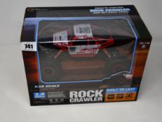 Six boxed as new Top Race Rock Crawler remote controlled car (1:18 scale).