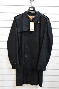 An as new Burberry Chelsea trench coat in black (EU 58 - RRP £1450).